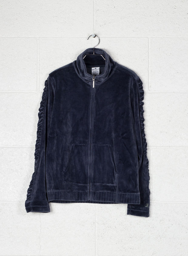 tuta champion lucida nera e oro