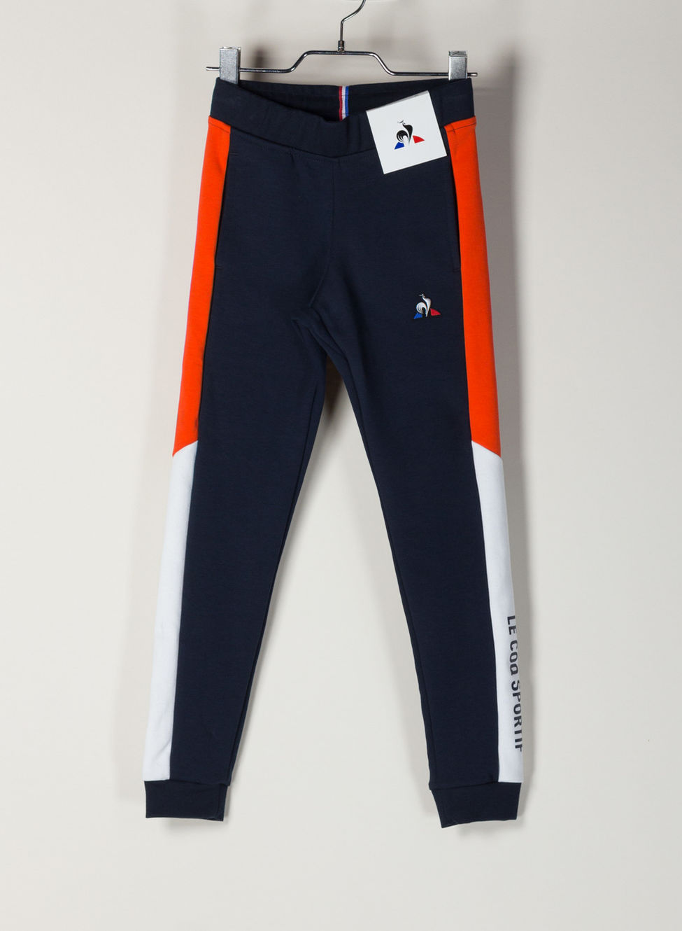 LE COQ SPORTIF PANTALONE LCS TECH RAGAZZO Arancione, Bianco, Blu, Rosso  Bambino | Sport85